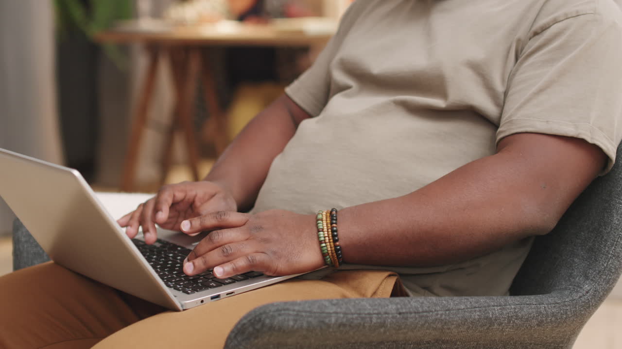 Male Hands Typing On Laptop