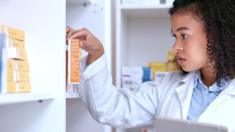 Female-chemist-or-pharmacist-organizing