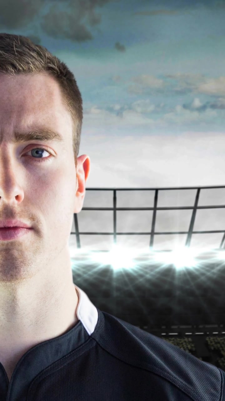 Animation of caucasian male rugby player holding ball over stadium