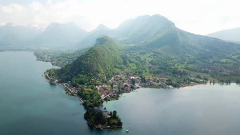 beautiful aerial view over lake annecy in french alps mountain valley