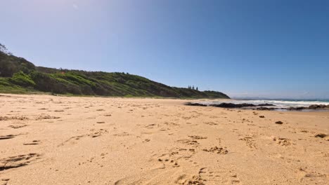 a serene beach scene with clear skies