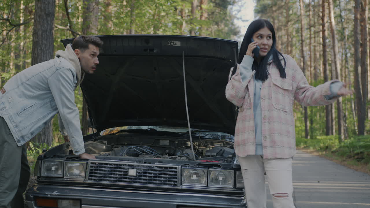 Couple with a Broken-Down Car