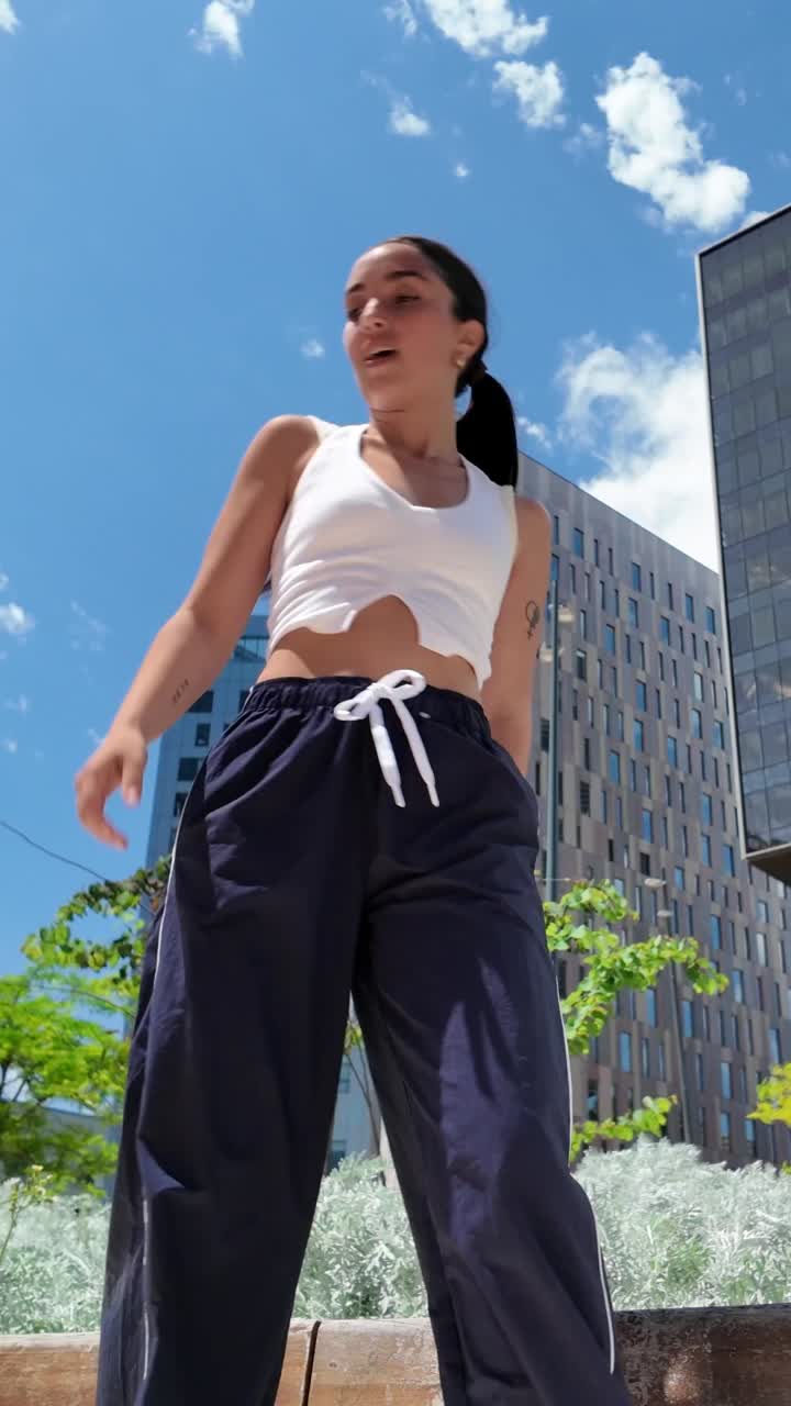 Woman dancing in an urban setting