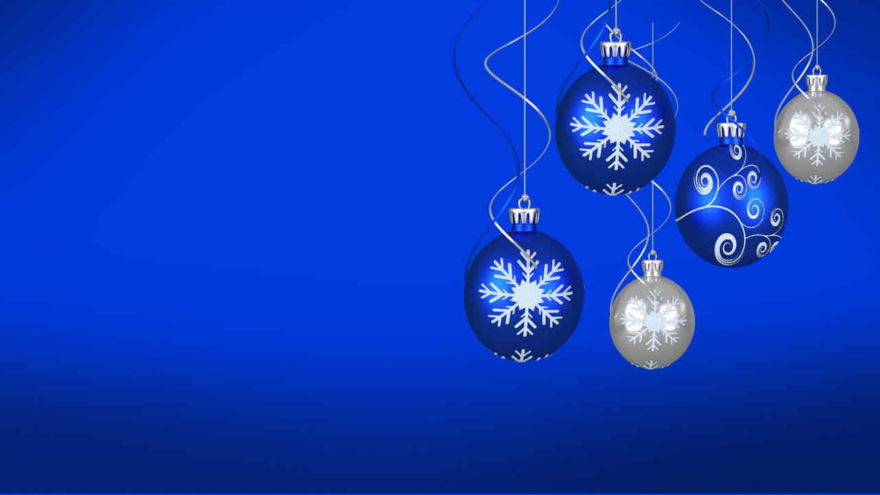 animación de bolas de navidad sobre fondo azul