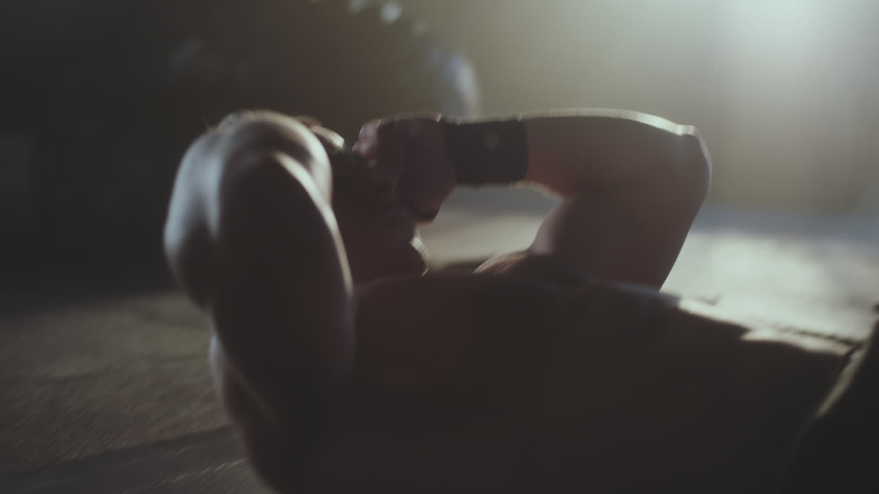 Man Doing Crunches in a Gym