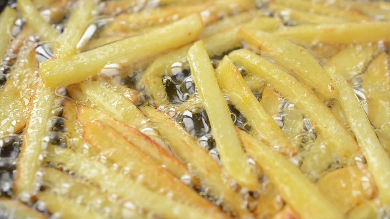 We fry French fries. French fries on a frying pan