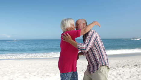 Happy-senior-couple-embracing-