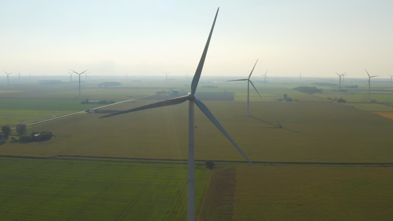 Wind turbines blow over farm land