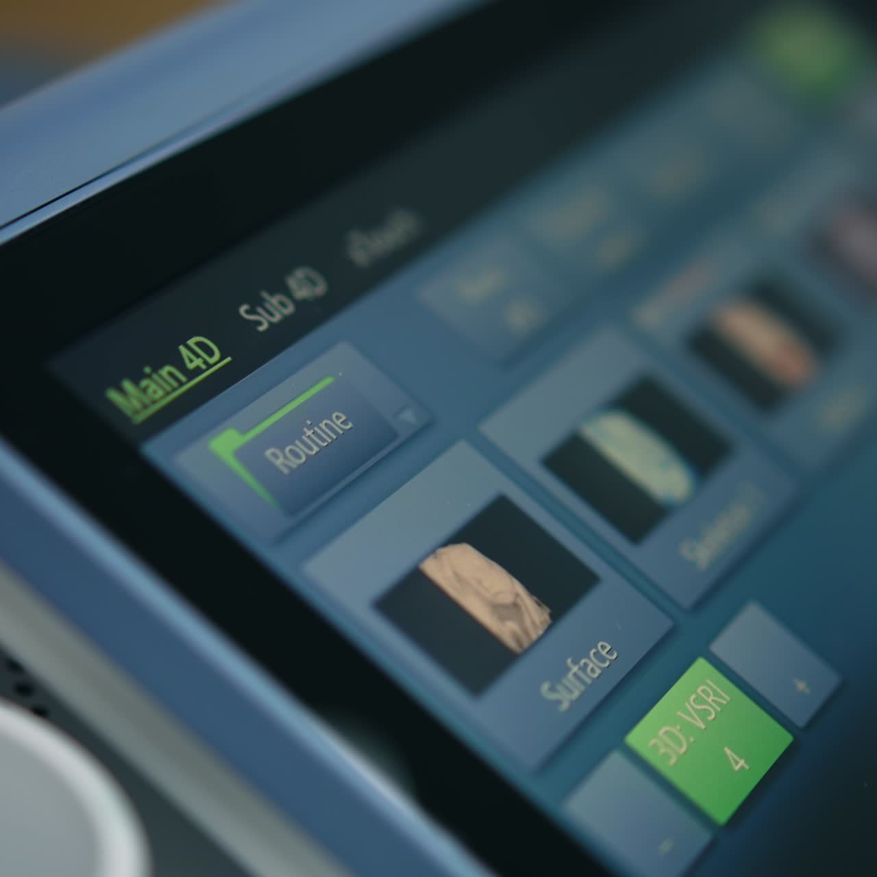 Working display of the modern ultrasound machine. Close up. Control system of advanced sonography equipment at modern clinics. Blurred backdrop