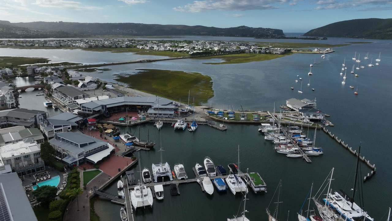Aerial establishing view of Knysna marina, South Africa.