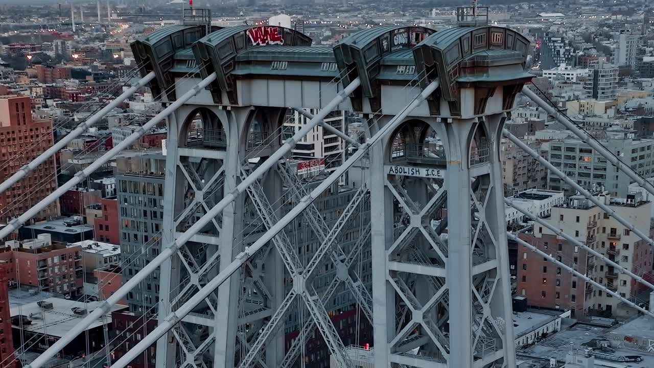 Close-up of Williamsburg Bridge towers and city
