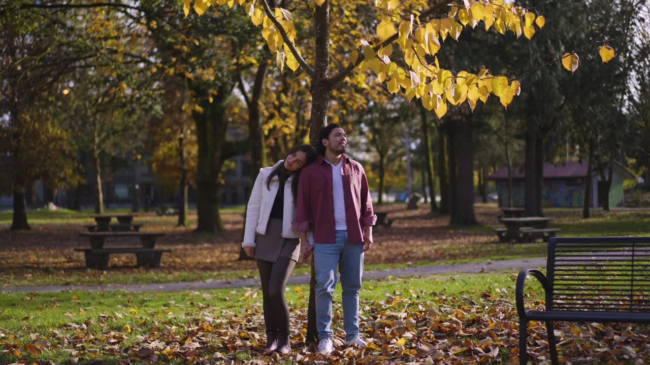 A couple enjoying themselves in the park