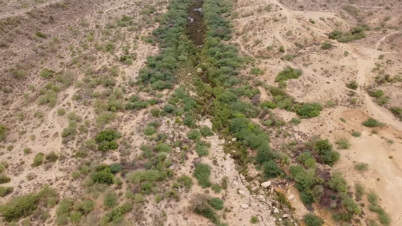 Aerial view of Pachran Aabshar, a green oasis in the arid Gadap desert, Karachi