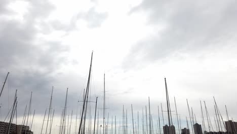 Boat-Masts-And-Rigging-At-Harbour-Against-Gloomy-Sky-In-Paddington-City,-New-South-Wales,-Australia