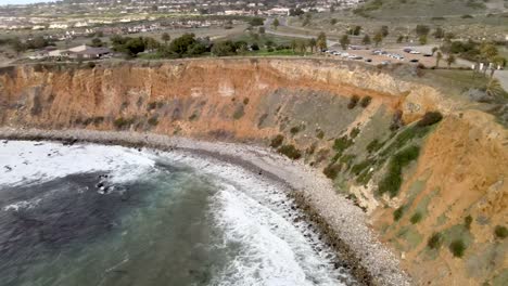 Ocean-waves-crashing-on-rocky-coast-near-Rancho-Palos-Verdes,-California