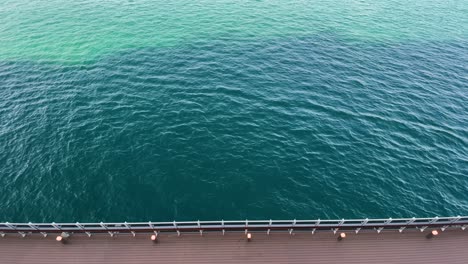 ocean sea from a cruise boat with sunshine seagull and different tonality of ocean water color