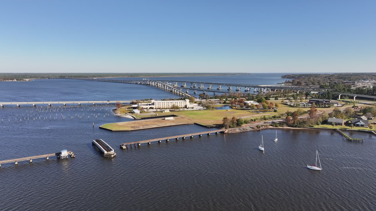 Drone shot the Downtown New Bern Waterfront area, with bridges over the river