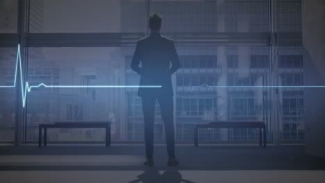 animation of monitor and data processing over caucasian businessman in office