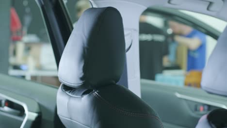 black leather seat covers in the car. beautiful leather car interior design. luxury leather seats in the car.