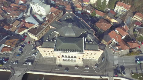 aerial view of sarajevo and national library, city halls and tram and traffic, bosnia and herzegovina