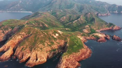 Amazing-Aerial-View-of-the-coastline-and-mountains-near-Bate-Head,-Tai-Long-Wan,-Sai-Kung,-Country-Park-in-the-East-of-Hong-Kong