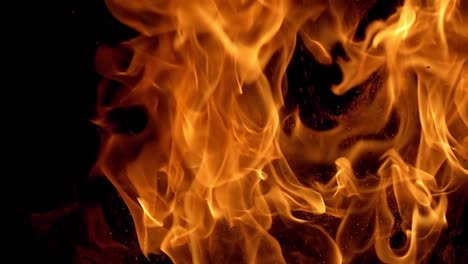 Flames-of-fire-on-black-background-in-slow-motion