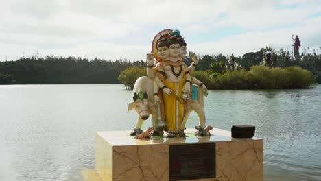 a small statue of hindu gods in mauritius temple