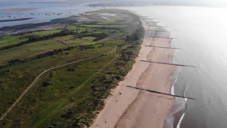 high aerial view of empty dawlish warren beach in south devon