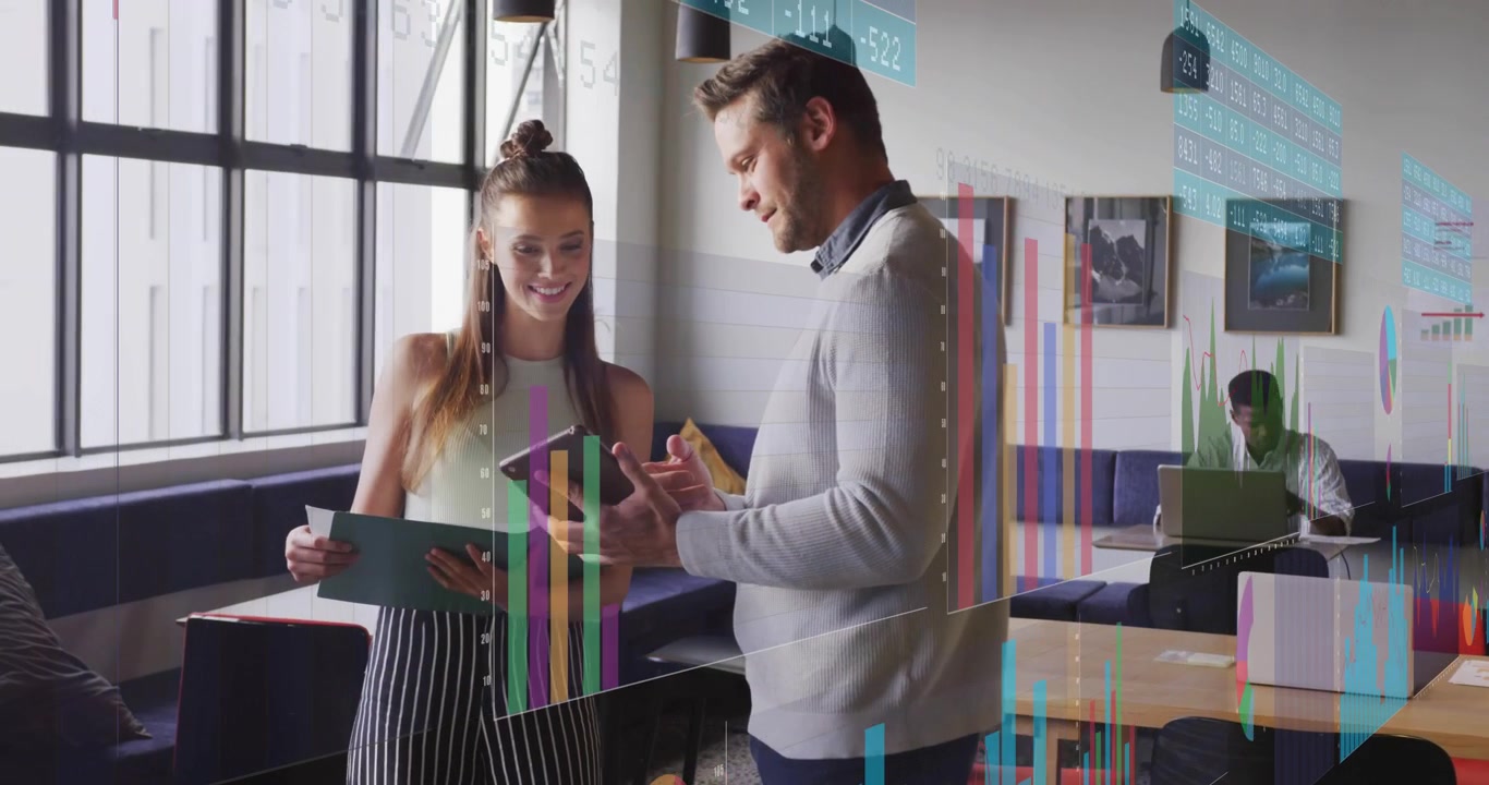 Business team members comparing printed data and tablet graphs while tapping, animating charts