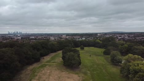 Extremer-wide-shot-of-empty-London-park-with-cityscape-backdrop