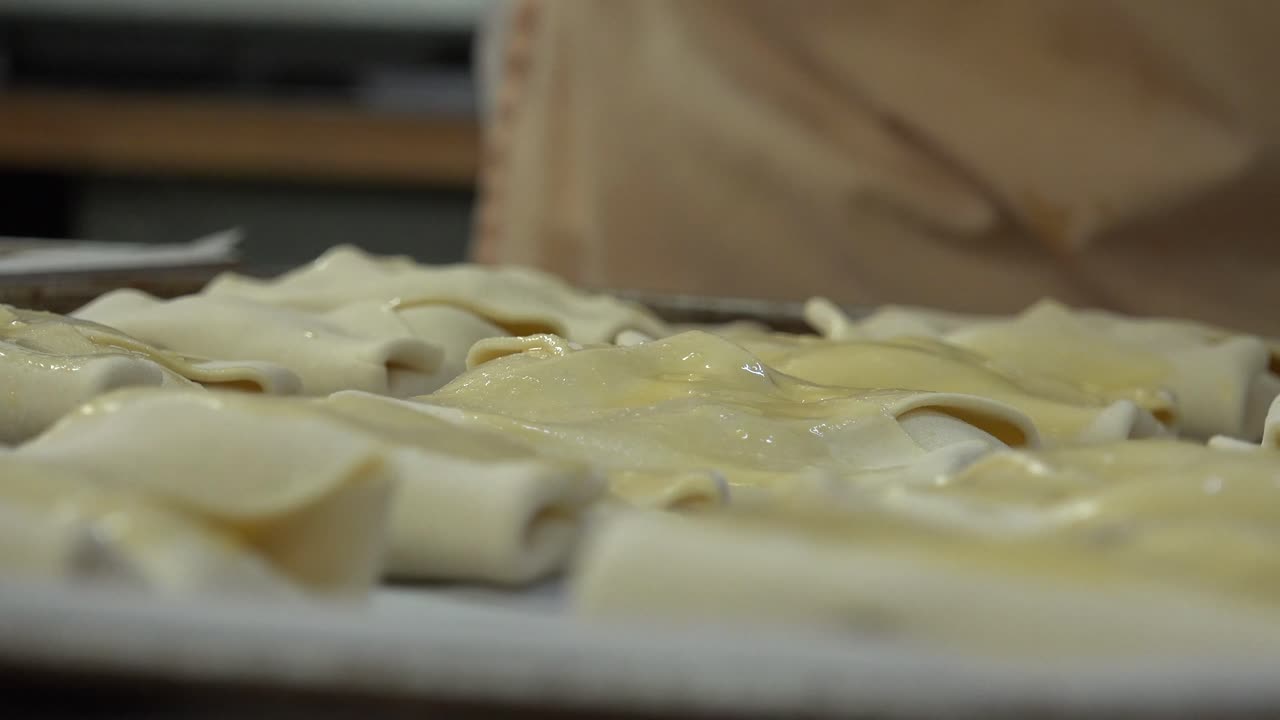 A bakery also baker's shop or bake shop is an establishment that produces and sells flour-based food baked in an oven such as bread, cookies, cakes, pastries, and pies