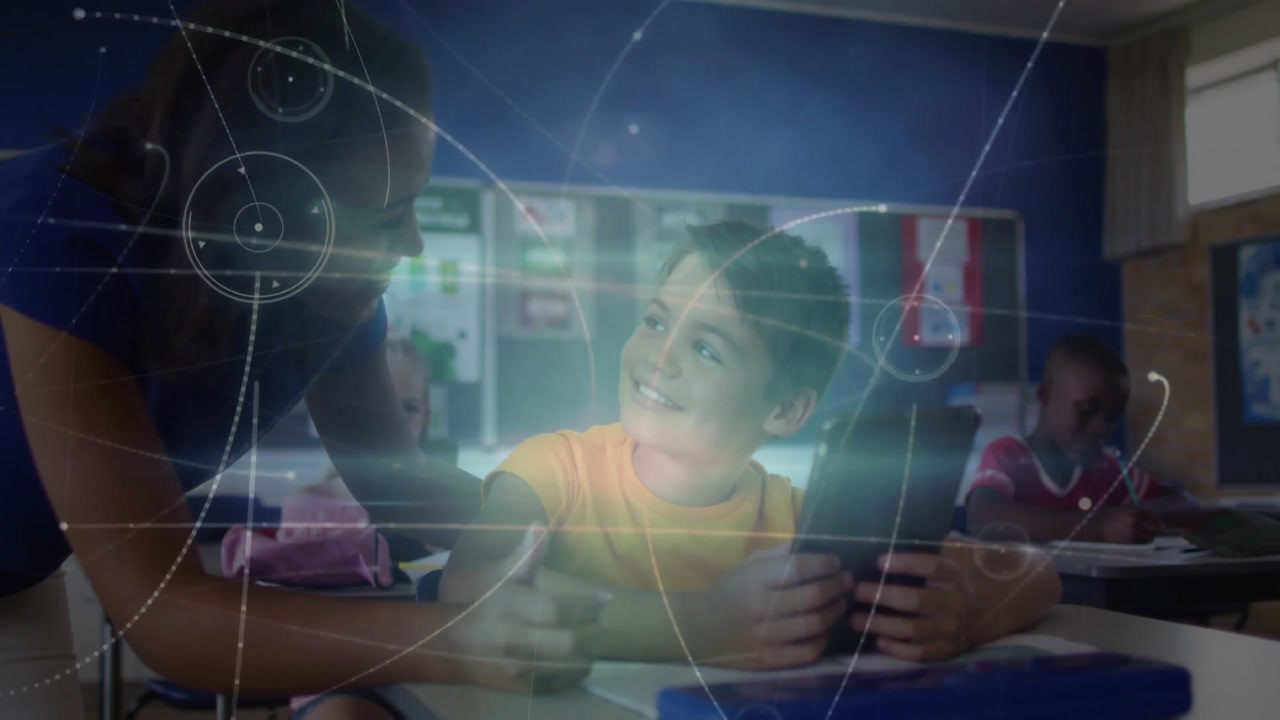 Teacher guiding student on tablet in classroom, initiating expanding network overlays around desk