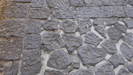 footsteps on ancient stone pavement in naples