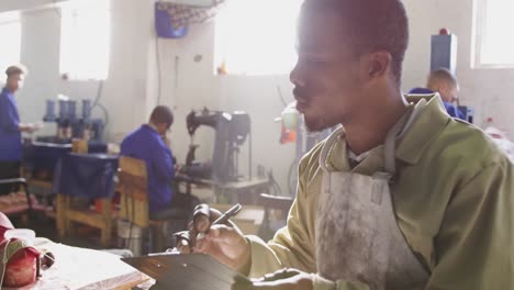 mixed race man working in factory