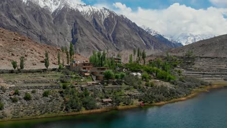 aerial view of village by lake borith in gojal at hunza valley