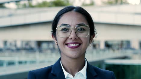 close-up view of businesswoman smiling at camera