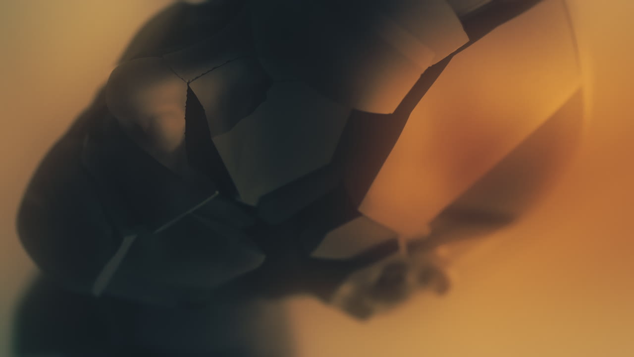 A crushed android head on a spike on the yellow background