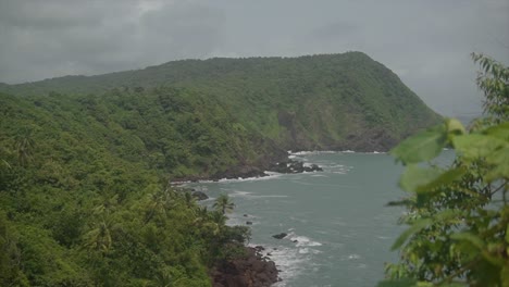 view of ocean's beautiful waves crashing on the rocky coast