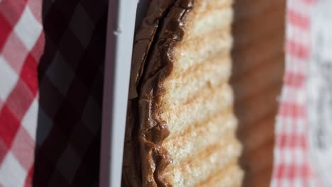 close-up of a grilled sandwich with checkered pattern