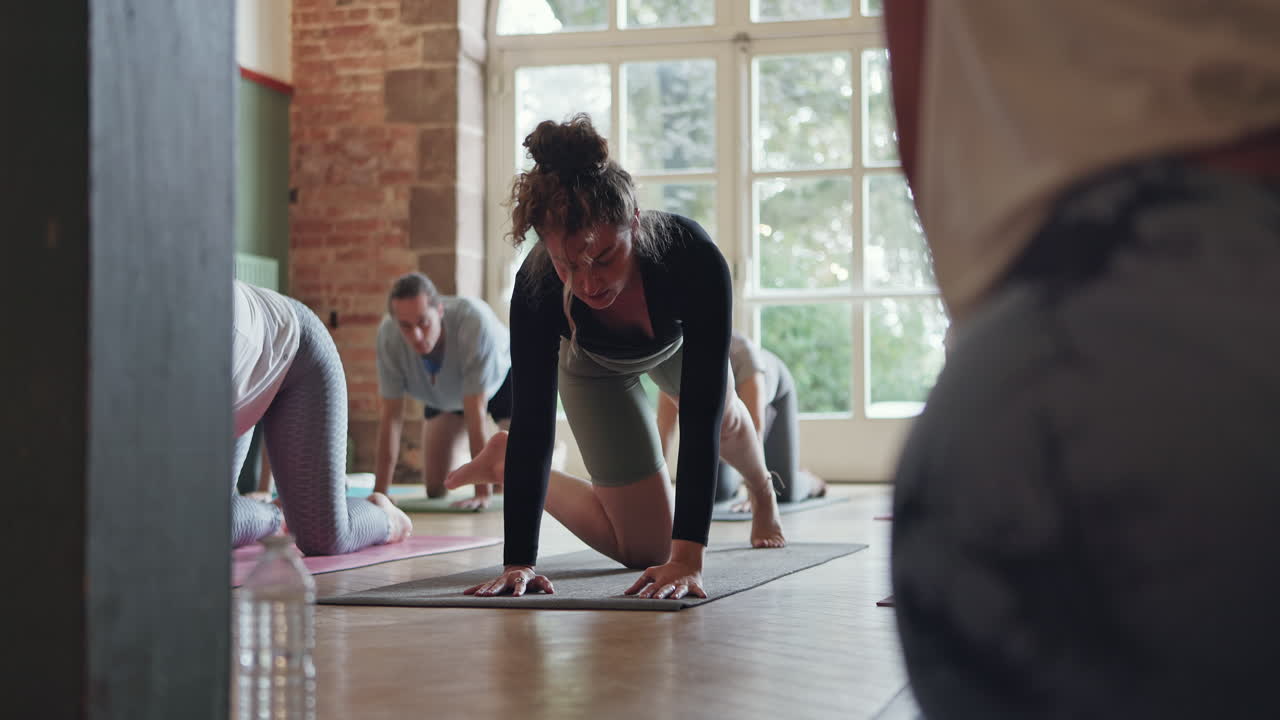 Yoga class practicing poses