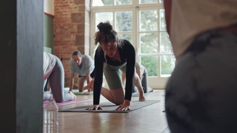 yoga class practicing poses