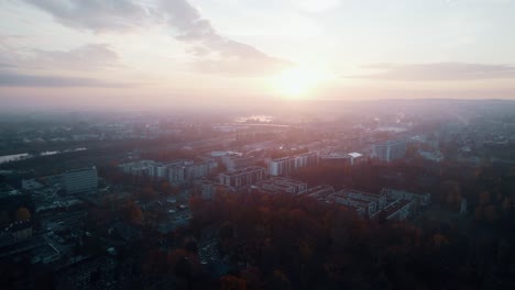 aerial view of bloody ang foggy sunrise over big city