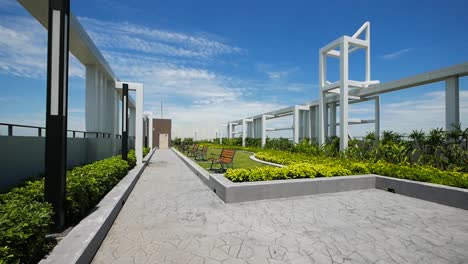 modern style garden on the buiding rooftop with clear blue sky background