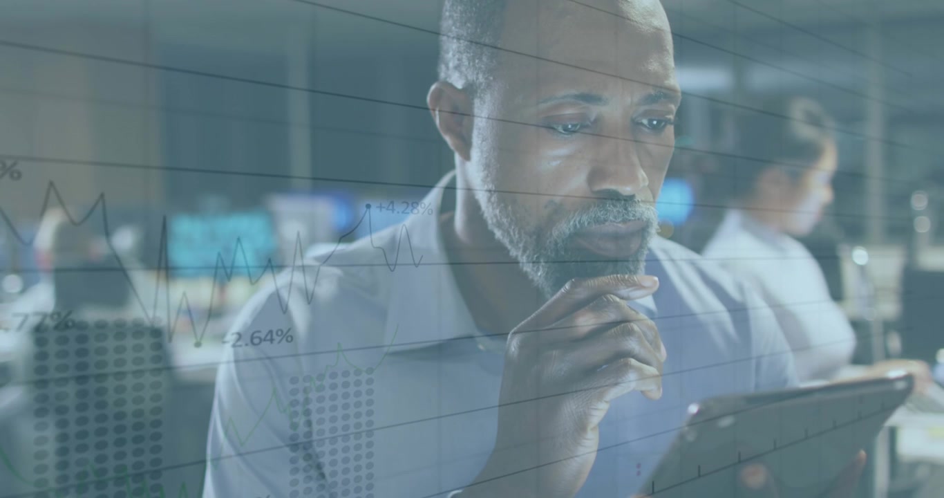 Animation of statistics and financial data processing over businessman using tablet