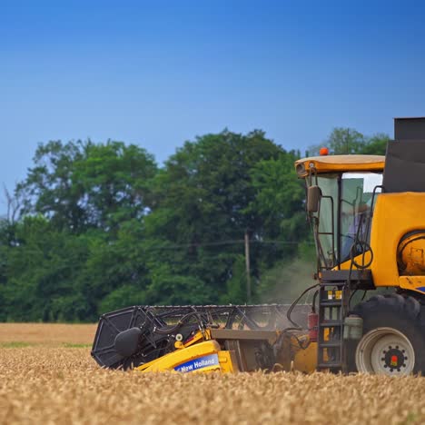 rural work in the field. a large agricultural machine working in field