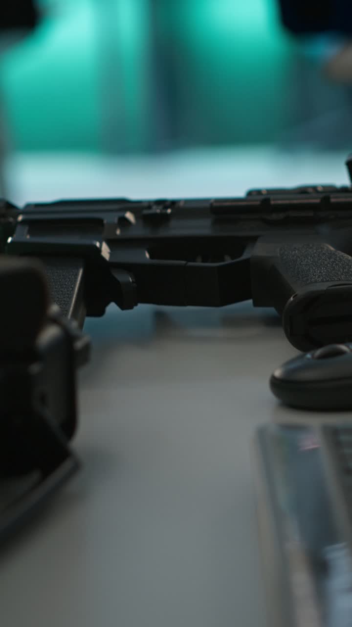 Vertical video Extreme close up of weapons in empty army command center