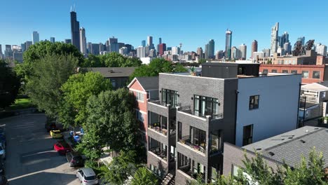 Chicago-skyline-descending-towards-modern-apartment-building-in-upscale-suburb-neighborhood