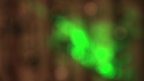 festive delicate white lights sway in the dark and a slow green beam.
