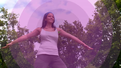 animation of love text over biracial woman practicing yoga