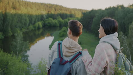 Couple Hiking in a Forest by the River